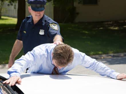 Immigration courtroom in the United States with a lawful permanent resident case involving domestic violence.